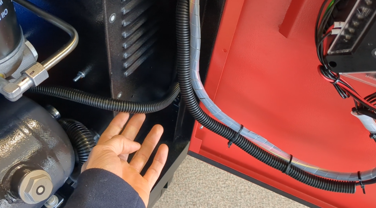 Loose cables inside a compressor